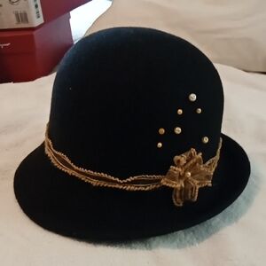Elegant Black Hat with Gold Accents